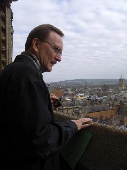 Bruce looking out on Oxford from the Tower of St. Mary's Church