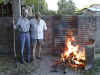 Oreste Barrone teaching Jim about "asado" (Argentine barbeque)